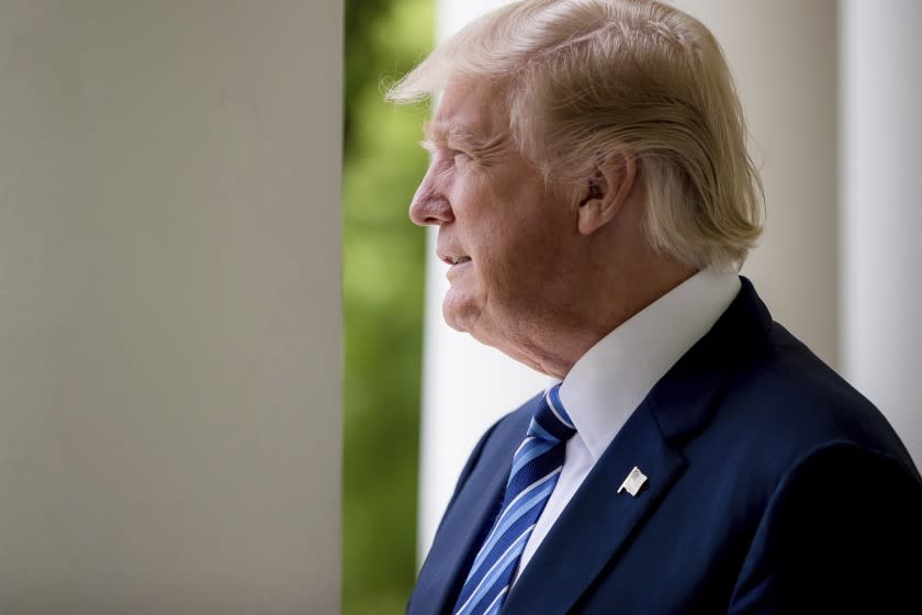 President Donald Trump poses for a photograph along the West Wing Colonnade at the White House in Washington, Friday, April 21, 2017, after a interview with The Associated Press.