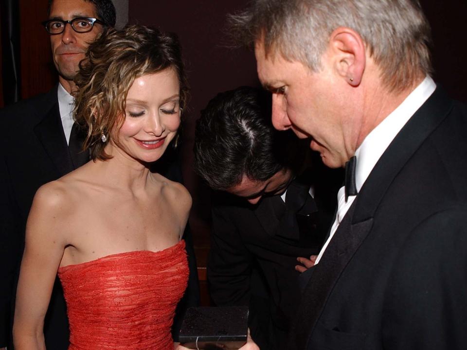 Calista Flockhart and Harrison Ford during 2002 Miramax Post Golden Globe Party in Beverly Hills, California, United States.