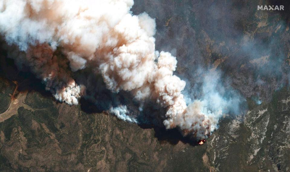 This satellite image provided by Maxar Technologies shows the active fire lines of the Hermits Peak wildfire, in Las Vegas, New Mexico, on Wednesday, May 11, 2022.