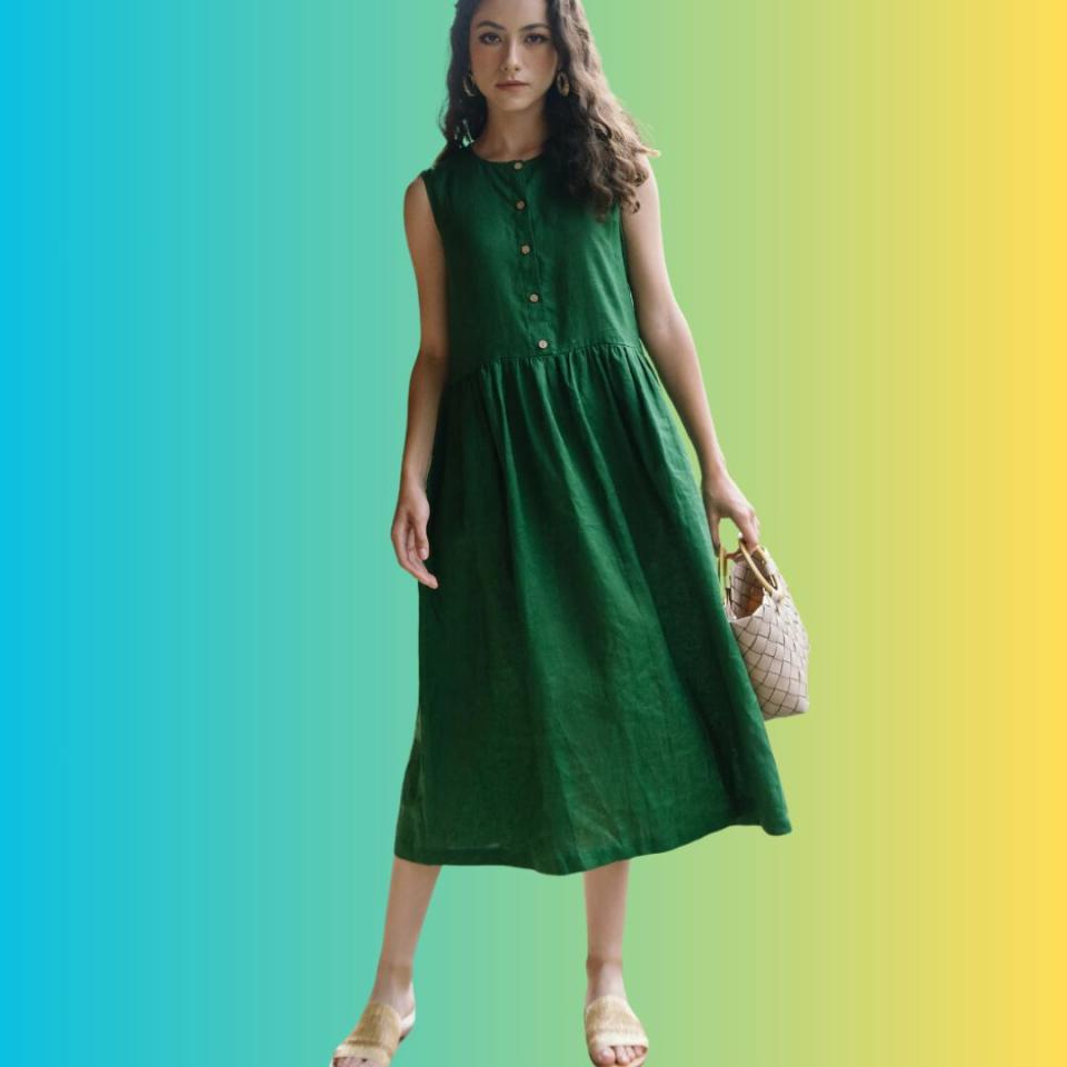 Model wearing the green dress