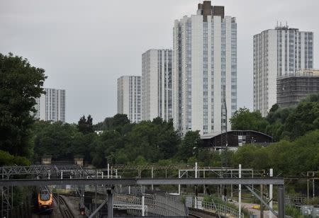 Cladding is seen on the outer walls of high rise tower blocks on the Chalcots Estate in north London, Britain, June 27, 2017. REUTERS/Hannah McKay