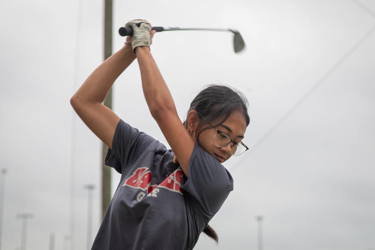 Veterans Memorial golfer Samantha Buemio practices at the Lozano Golf Course driving range on Thursday, May 2, 2024, in Corpus Christi, Texas.