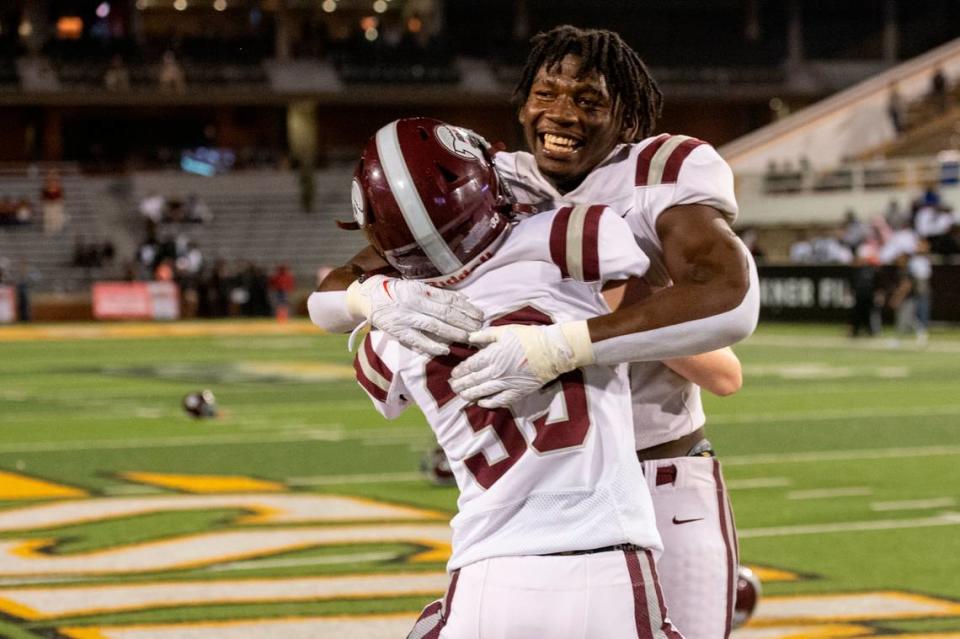 Picayune players celebrate after winning the 5A State Championship at M.M. Roberts Stadium in Hattiesburg on Friday, Dec. 2, 2022.