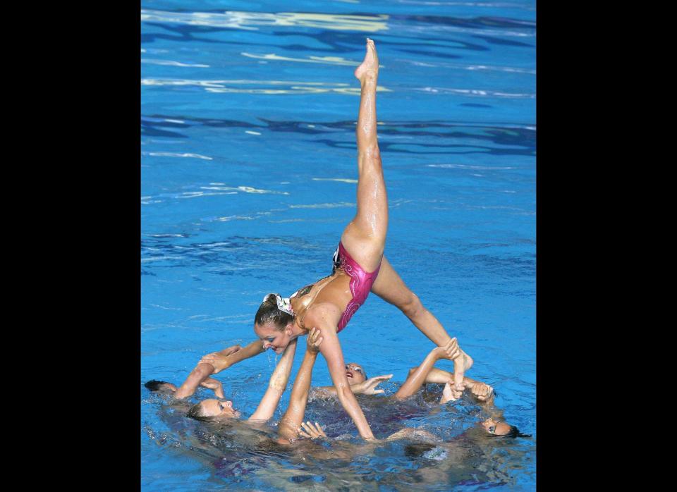 USA team synchro swimmers perform 24 March 2007 at the Susie O'Neill pool in Melbourne during the team free routine final of the 12th FINA World Swimming Championships. Russia won gold in the event with Spain taking silver and Japan the bronze. USA placed fifth. 