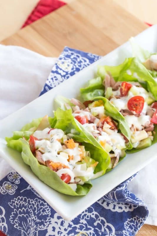 <p>Cupcakes & Kale Chips</p><p>Transform a popular salad recipe into an easy lunch that you can pick up and eat with your hands.</p><p><strong>Get the recipe: <a href="https://cupcakesandkalechips.com/chefs-salad-lettuce-wraps/" rel="nofollow noopener" target="_blank" data-ylk="slk:Chef’s Salad Lettuce Wraps;elm:context_link;itc:0;sec:content-canvas" class="link rapid-noclick-resp">Chef’s Salad Lettuce Wraps</a></strong></p>