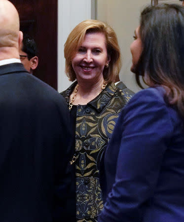 White House Deputy National Security Advisor Mira Ricardel appears with U.S. President Donald Trump at a Diwali ceremony as the office of first lady Melania Trump announced a request from the first lady that Ricardel be fired at the White House in Washington, U.S. November 13, 2018. REUTERS/Jonathan Ernst