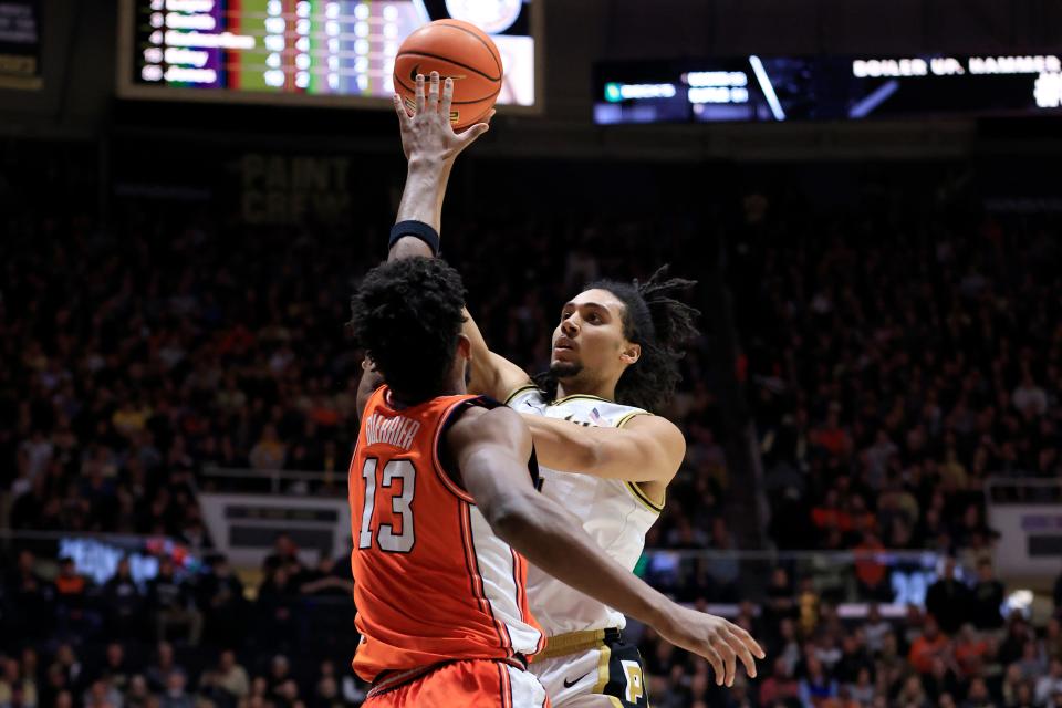 WEST LAFAYETTE, INDIANA - JANUARY 05: Trey Kaufman-Renn #4 of the Purdue Boilermakers takes a shot over Quincy Guerrier #13 of the Illinois Fighting Illini during the second half at Mackey Arena on January 05, 2024 in West Lafayette, Indiana. (Photo by Justin Casterline/Getty Images)