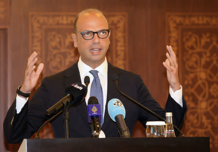 Italian foreign minister Angelino Alfano gestures during a joint news conference with Qatar's foreign minister Sheikh Mohammed bin Abdulrahman al-Thani in Doha, Qatar, August 2, 2017. REUTERS/Naseem Zeitoon