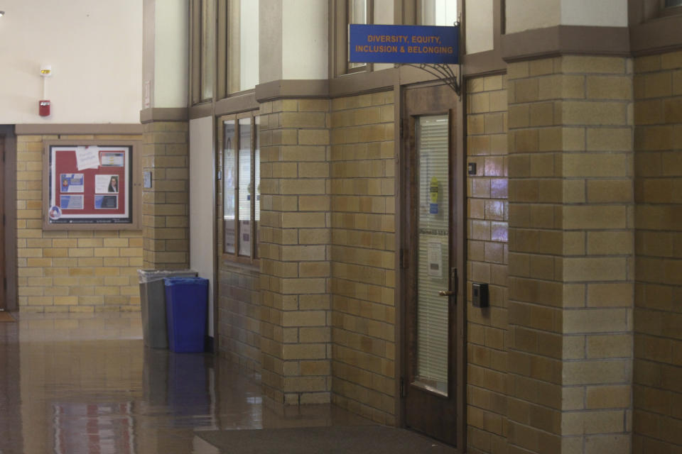 This photo from Friday, April 12, 2024, shows the door to the Office of Diversity, Equity, Inclusion and Belonging in the main administration building on the main University of Kansas campus in Lawrence, Kan. Republican legislators in Kansas and other states are trying to restrict diversity, equity and inclusion initiatives in higher education. (AP Photo/John Hanna)