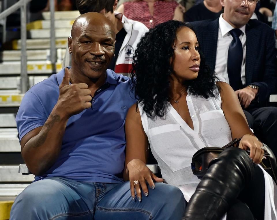 Mike Tyson and his wife Lakiha Tyson.
