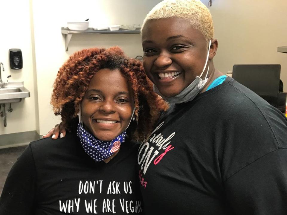 Sisters Arvelisha Woods and India Pernell plan to keep wearing masks, and asking their customers to do the same, at their vegan restaurant, Mattie’s Foods.