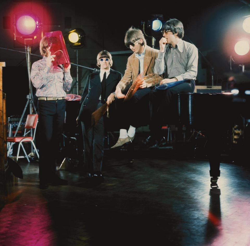 The Beatles (John Lennon, Ringo Starr, George Harrison and Paul McCartney) in Abbey Road Studios during filming of the "Paperback Writer" and "Rain" promotional films on May 19, 1966.