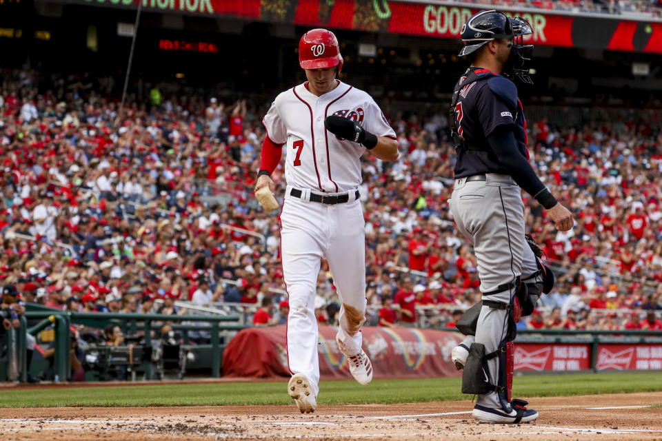 Washington Nationals' Trea Turner scores on a double by Washington Nationals' Juan Soto during the first inning of a baseball game against the Cleveland Indians at Nationals Park, Sunday, Sept. 29, 2019, in Washington. (AP Photo/Andrew Harnik)