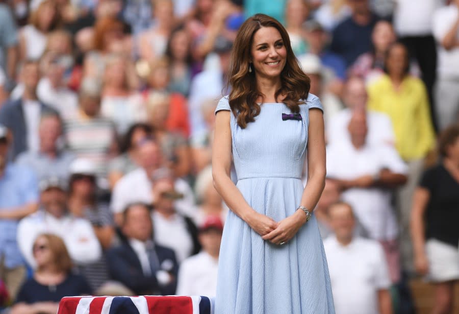 FILE – Britain’s Kate, Duchess of Cambridge stands on centre court during the trophy presentation after Serbia’s Novak Djokovic defeated Switzerland’s Roger Federer during the men’s singles final match of the Wimbledon Tennis Championships in London, Sunday, July 14, 2019. (Laurence Griffiths/Pool Photo via AP, File)