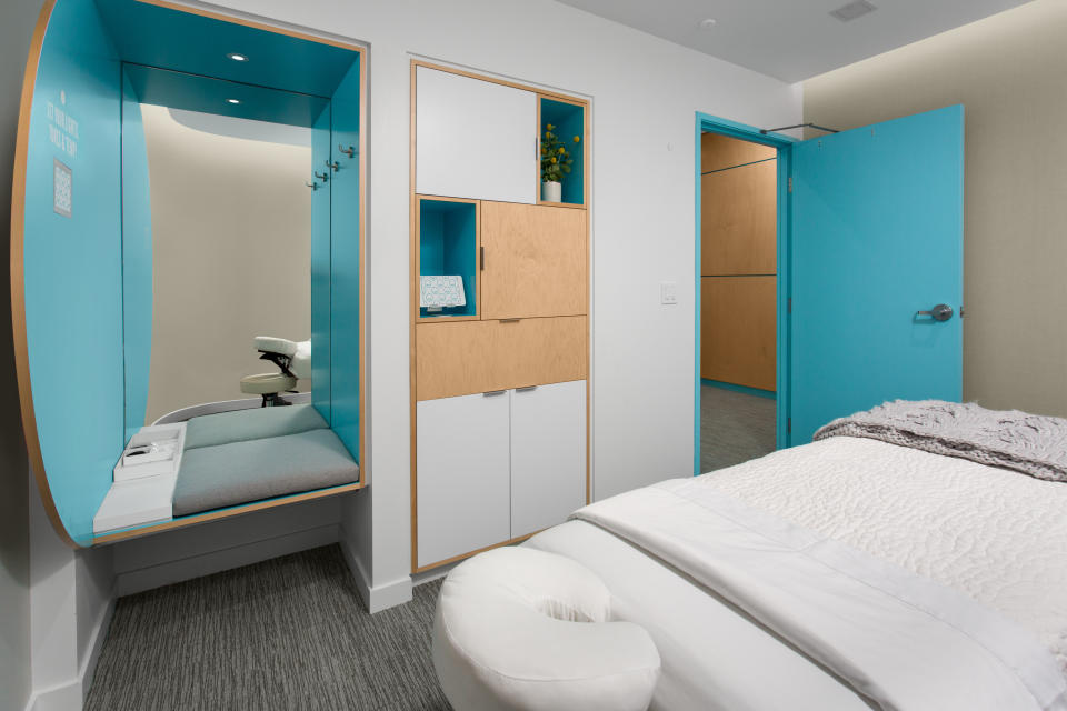 Squeeze treatment room featuring the brand's signature blue accents. 