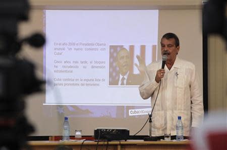 Cuba's Deputy Foreign Minister Abelardo Moreno speaks during a news conference at the William Soler Children's Heart Center in Havana October 7, 2013. REUTERS/Desmond Boylan