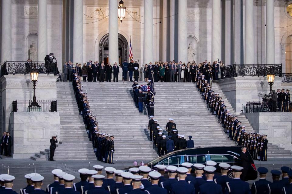 8) The casket is carried into the U.S. Capitol.