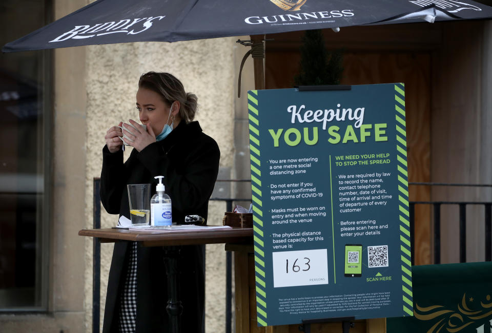 Woman outside pub