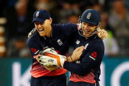 Cricket - England vs West Indies - Third One Day International - Brightside Ground, Bristol, Britain - September 24, 2017 England's Ben Stokes and Jos Buttler celebrate after Adil Rashid (not pictured) takes the wicket of West Indies' Jerome Taylor Action Images via Reuters/Peter Cziborra