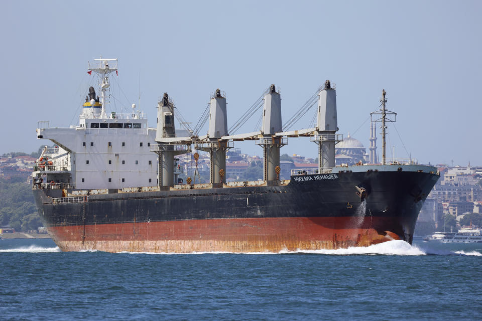 The cargo ship Mikhail Nenashev sails through the Bosphorus Strait in Istanbul, Turkey, on July 4, 2022. An Associated Press investigation shows the ship, owned by a sanctioned Russian state-owned defense contractor, is part of an extensive Russian-run smuggling operation that has been hauling stolen Ukrainian grain from ports in occupied Crimea to customers in the Middle East. (AP Photo/Yoruk Isik)