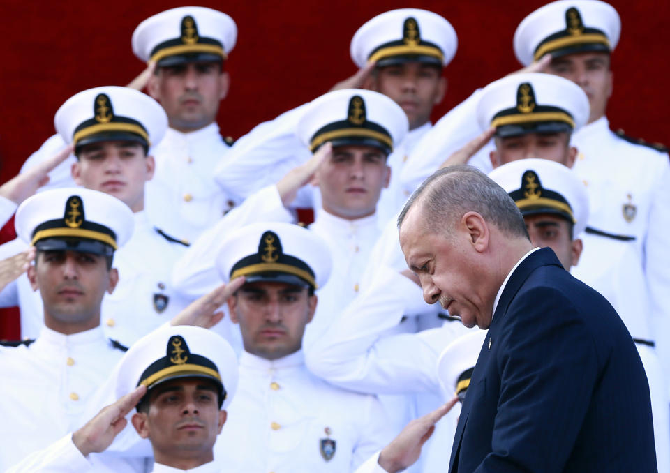 Turkey's President Recep Tayyip Erdogan, arrives to deliver a speech to graduates of a military academy in Istanbul, Saturday, Aug. 31, 2019. Erdogan said the U.S. had up to three weeks to satisfy Turkish demands and has threatened to launch a unilateral offensive into northeastern Syria if plans to establish a so-called safe zone along Turkey's border fail to meet his expectations. Earlier this month, Turkish and U.S. officials agreed to set up the zone east of the Euphrates River. (Presidential Press Service via AP, Pool)
