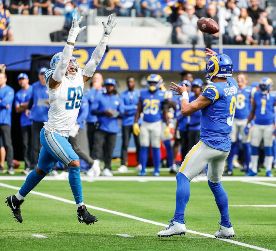 Detroit Lions linebacker Julian Okwara (99) tries to block a pass from Los Angeles Rams quarterback Matthew Stafford (9) during the first half at the SoFi Stadium in Inglewood, Calif. on Sunday, Oct. 24, 2021.