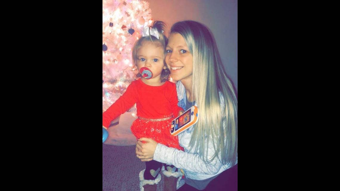 Mackenzie “Mickey” Hopkins, 24, is pictured with her daughter, Bella. After they were attacked in their home, Bella spent weeks in intensive care. Hopkins did not survive.