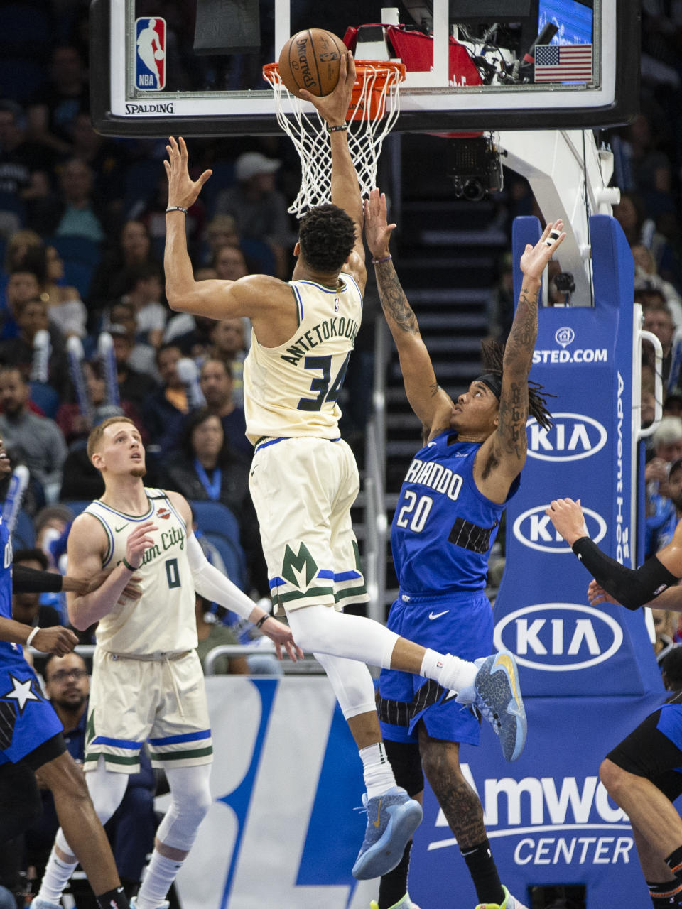 Milwaukee Bucks forward Giannis Antetokounmpo (34) shoots over Orlando Magic guard Markelle Fultz (20) during the first half of an NBA basketball game in, Orlando, Fla., Saturday, Feb. 8, 2020. (AP Photo/Willie J. Allen Jr.)