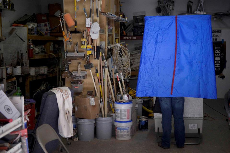 Voting in garage of Chobert Decorators’s garage in Philadelphia, Pa.