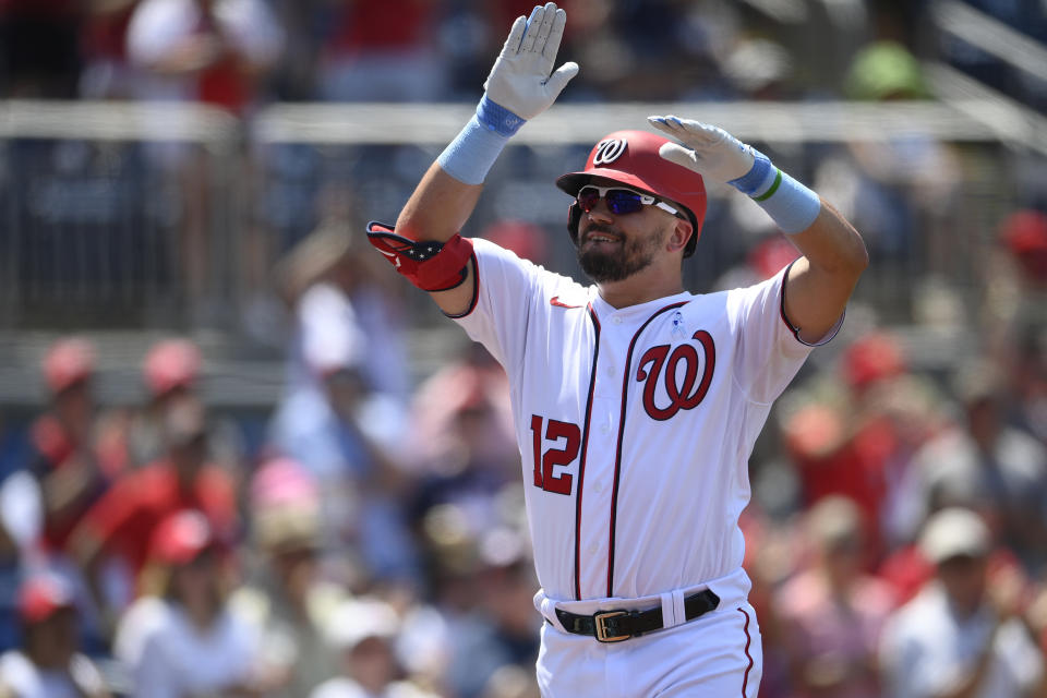 Washington Nationals' Kyle Schwarber celebrates his home run during the fifth inning of a baseball game against the New York Mets, Sunday, June 20, 2021, in Washington. (AP Photo/Nick Wass)