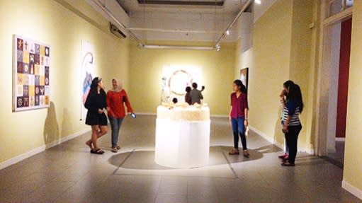 In the playground of identity: Visitors look around the 8th National Gallery biennale exhibition.