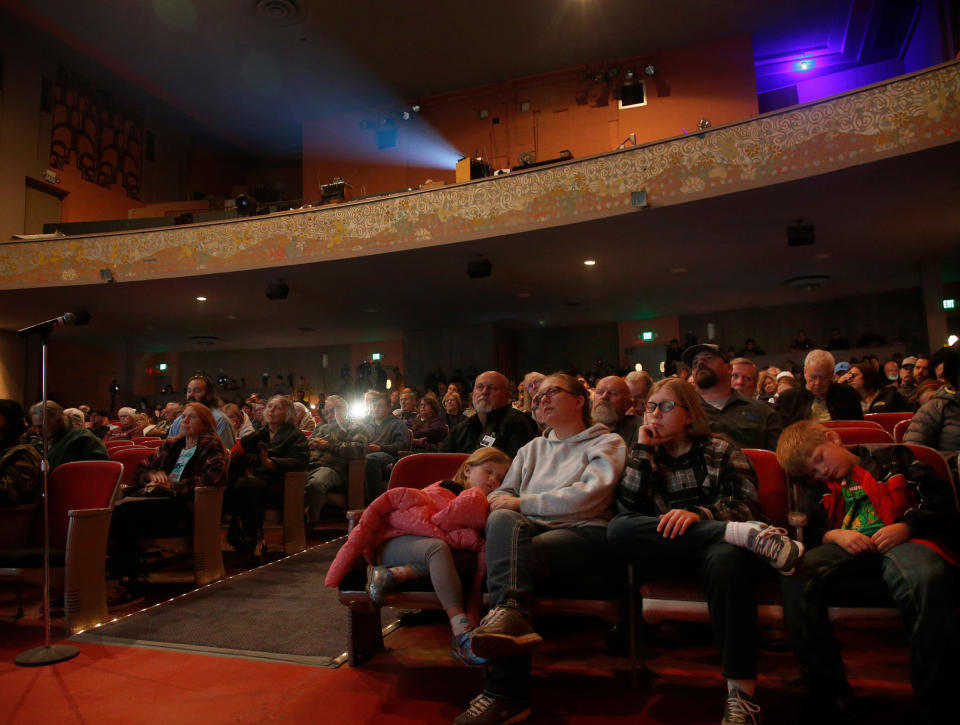 Image: Families seeking information from police and fire officials fill the State Theater in Oroville, Calif., on day five of the deadly Camp Fire on Nov. 12, 2018. (Karl Mondon / MediaNews Group via Getty Images file)