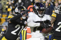 Baltimore Ravens wide receiver Sammy Watkins (14) makes a touchdown catch as Pittsburgh Steelers cornerback Tre Norwood (21) defends during the second half of an NFL football game, Sunday, Dec. 5, 2021, in Pittsburgh. The Steelers won 20-19. (AP Photo/Don Wright)