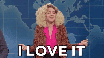 Woman on "Weekend Update" segment on SNL saying "I love it" while shaking her shoulders