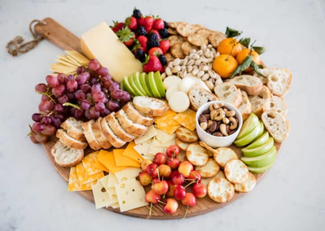 <p>I Heart Naptime</p><p>Learn how to assemble an amazing fruit and cheese platter for your next party. Pick your favorite fruits, cheeses and fillers to make your platter the star of the show!</p><p><strong>Get the recipe: </strong><a href="https://www.iheartnaptime.net/fruit-and-cheese-platter/" rel="nofollow noopener" target="_blank" data-ylk="slk:Fruit and Cheese Platter;elm:context_link;itc:0;sec:content-canvas" class="link rapid-noclick-resp"><strong>Fruit and Cheese Platter</strong></a></p>