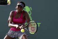 Mar 26, 2017; Miami, FL, USA; Venus Williams of the United States hits a backhand against Patricia Maria Big of Romania (not pictured) on day six of the 2017 Miami Open at Crandon Park Tennis Center. Mandatory Credit: Geoff Burke-USA TODAY Sports