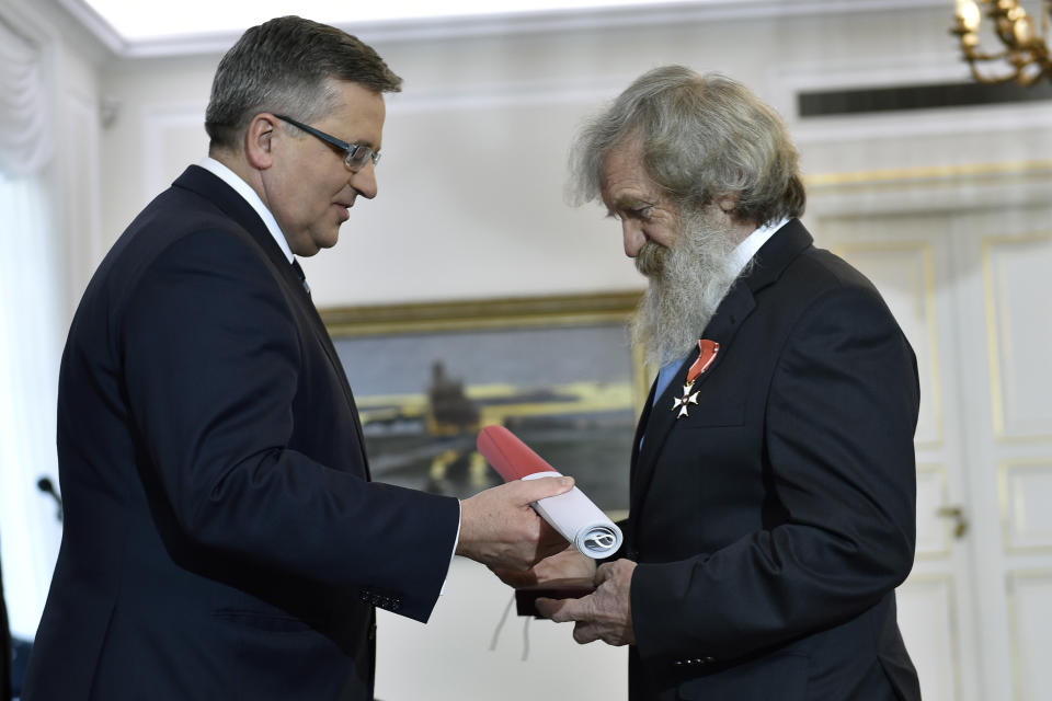 WARSAW, POLAND  FEBRUARY 16(SOUTH AFRICA AND POLAND OUT): President Bronislaw Komorowski meet with Gabriela Doba and Aleksander Doba on February 16, 2015 at the Belvedere Palace in Warsaw, Poland. Aleksander Doba is the winner of 2015 National Geographic Peoples Choice Adventurer of the Year. At 67 years old, Doba, an adventurer, completed the longest open-water kayak crossing of the Atlantic. (Photo by Adam Jagielak/Getty Images Poland/Gallo Images/Getty Images)