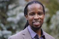 FILE - In this Oct. 21, 2021, file photo, Ibram X. Kendi, director of Boston University's Center for Antiracist Research, stands for a portrait in Boston. Racism, COVID-19 and other big issues of the day figure prominently in the work of many of the 25 recipients of this year's John D. and Catherine T. MacArthur Foundation's "genius grants," announced Tuesday, Sept. 28, 2021. The group includes Ibram X. Kendi, the best selling author of "How to be an Antiracist." (AP Photo/Steven Senne, File)