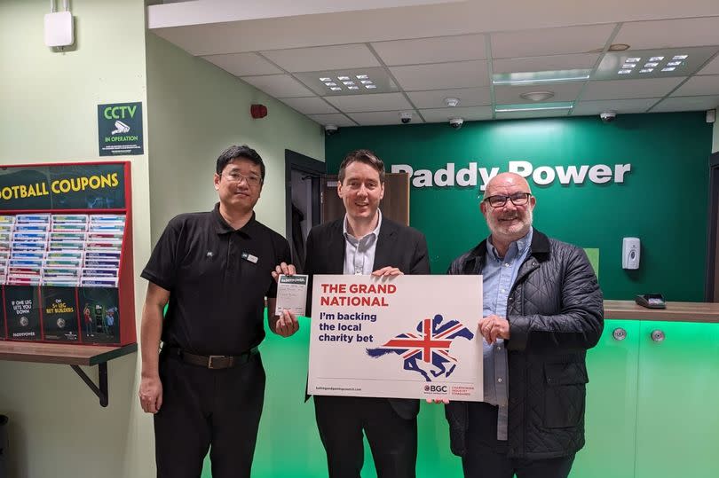 Neil Bibby MSP with Paddy Power's Dong Wang and Scott Nicholson at the Neilston Road shop