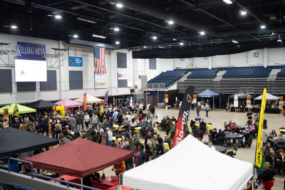 Tents and tables set up on the arena floor during The Big Cheese Mac and Cheese Festival at Kellogg Arena on Saturday, April 20, 2024.