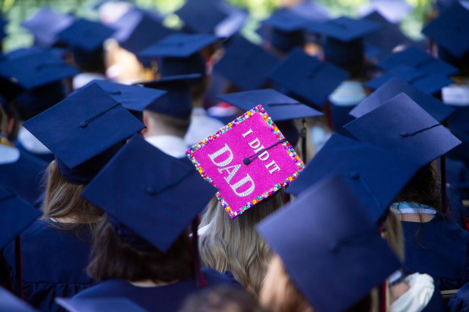 One Ole Miss student paid tribute to a parent with a special note at University of Mississippi graduation on Saturday in the Grove in Oxford.