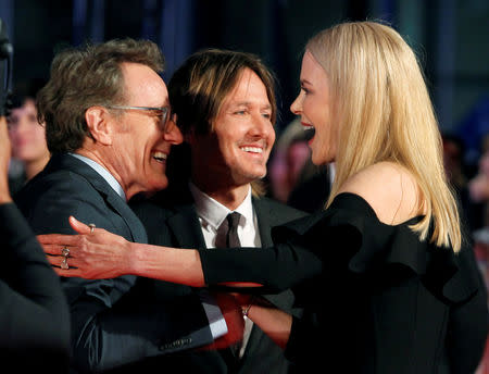 FILE PHOTO: Actor Nicole Kidman arrives with her husband Keith Urban and actor Bryan Cranston at the premiere of the film "The Upside" at Toronto International Film Festival (TIFF) in Toronto, September 8, 2017. REUTERS/Fred Thornhill/File Photo