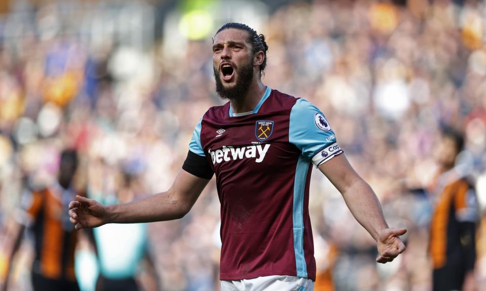 <p>West Ham United’s Andy Carroll gestures towards an assistant referee </p>