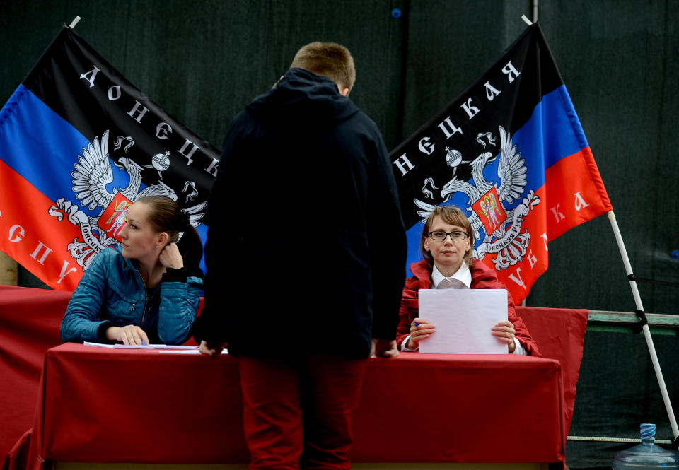 MOSCOW, RUSSIA - MAY 11:  Ukrainians living in Moscow cast their votes a polling station during the self-rule referendum held by pro-Russians in the provinces of Donetsk and Lugansk, on May 11, 2014 in the Russian capital of Moscow. (Photo by Sefa Karacan/Anadolu Agency/Getty Images)