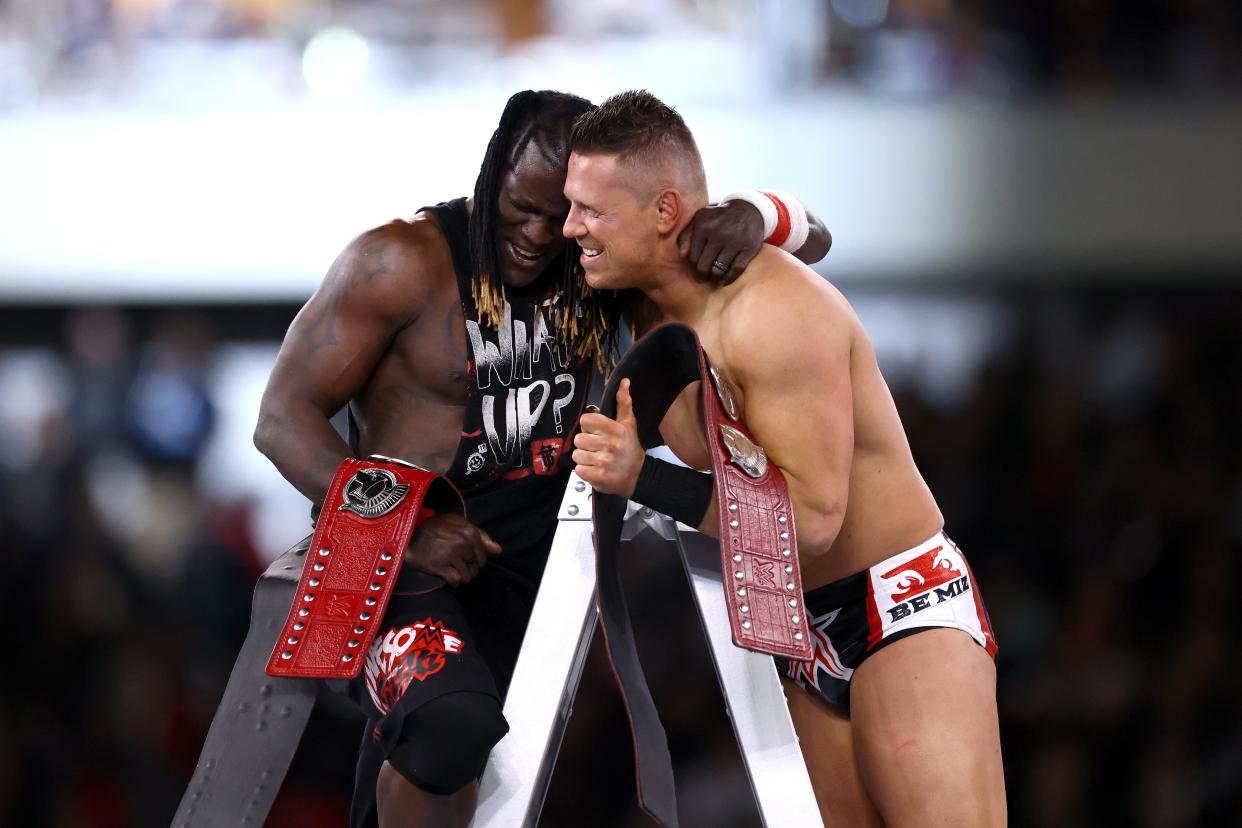 The Miz (right) and R-Truth celebrate winning the Raw tag-team titles (Getty Images)
