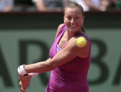 Czech Republic's Petra Kvitova hits a return to Russia's Nina Bratchikova during their French Open match at the Roland Garros stadium in Paris. Kvitova reached the last 16 for the third time but she did it the hard way, serving up eight double faults and committing 37 unforced errors in her 6-2, 4-6, 6-1 win