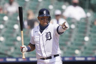 Detroit Tigers' Miguel Cabrera points to the first base umpire for a check swing during the third inning of a baseball game against the Minnesota Twins, Tuesday, April 6, 2021, in Detroit. (AP Photo/Carlos Osorio)