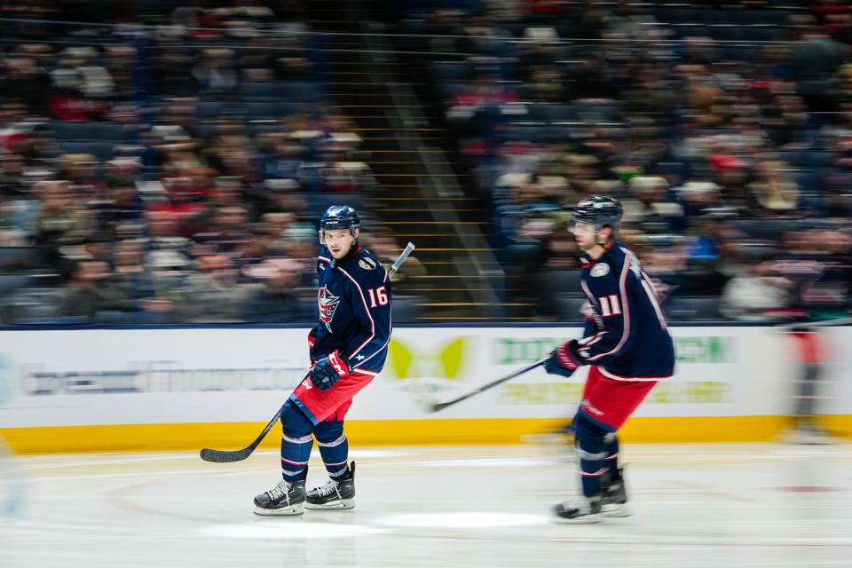 Jan 2, 2024; Columbus, Ohio, USA; Columbus Blue Jackets center Brendan Gaunce (16) and center Adam Fantilli (11) take the ice for the second period of the NHL hockey game against the Boston Bruins at Nationwide Arena.