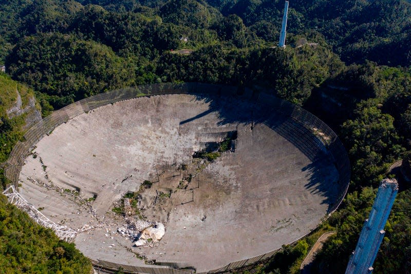 An aerial photo of the destroyed radio dish.