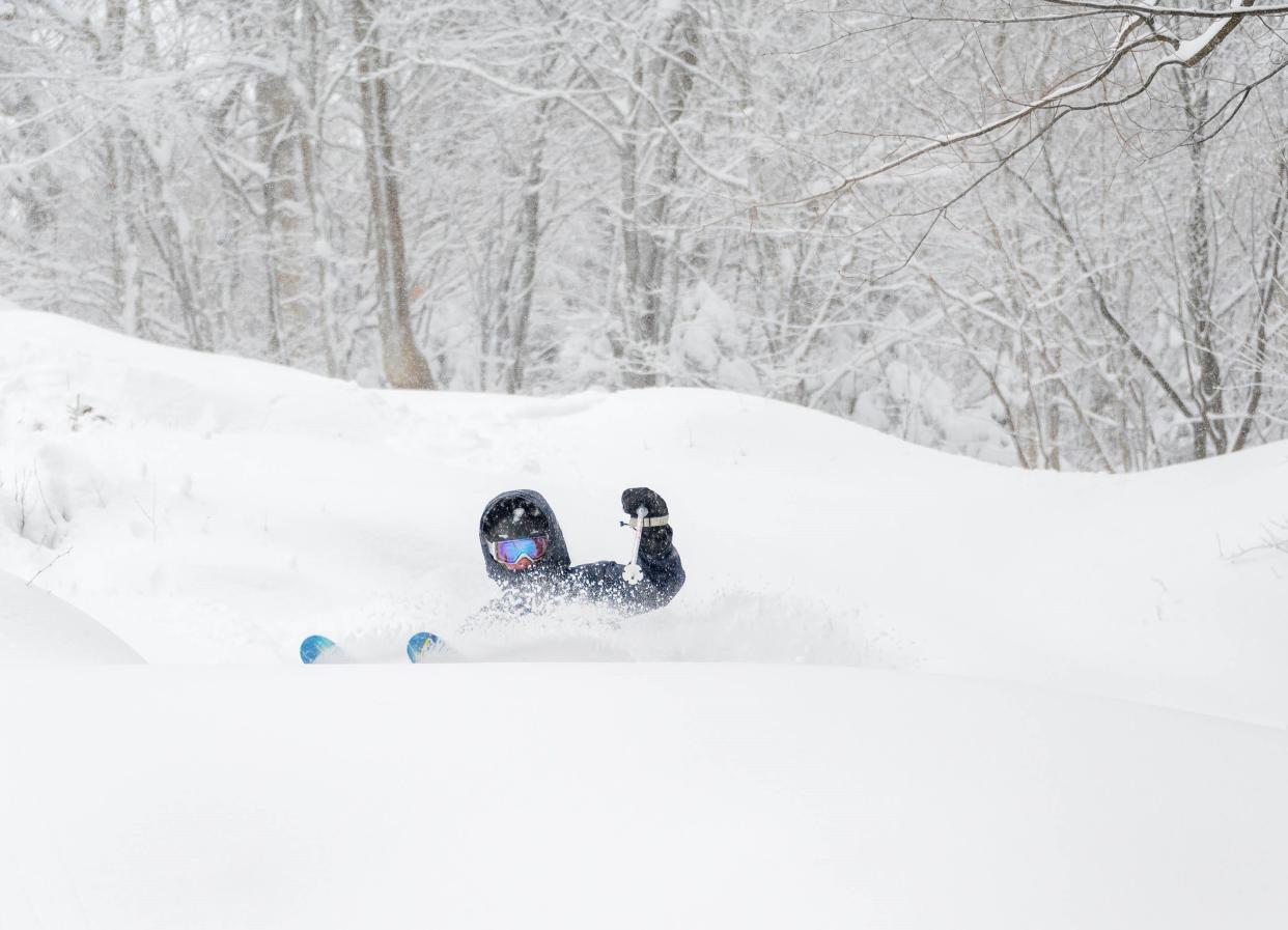 Deep in powder at Mad River Glen Cooperative ski resort.